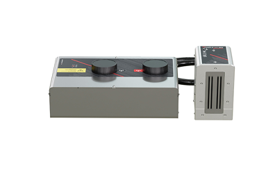 Benchtop adjustable power supply with two large knobs connected to a metal rack module, used to provide controlled voltage/current in a laboratory.